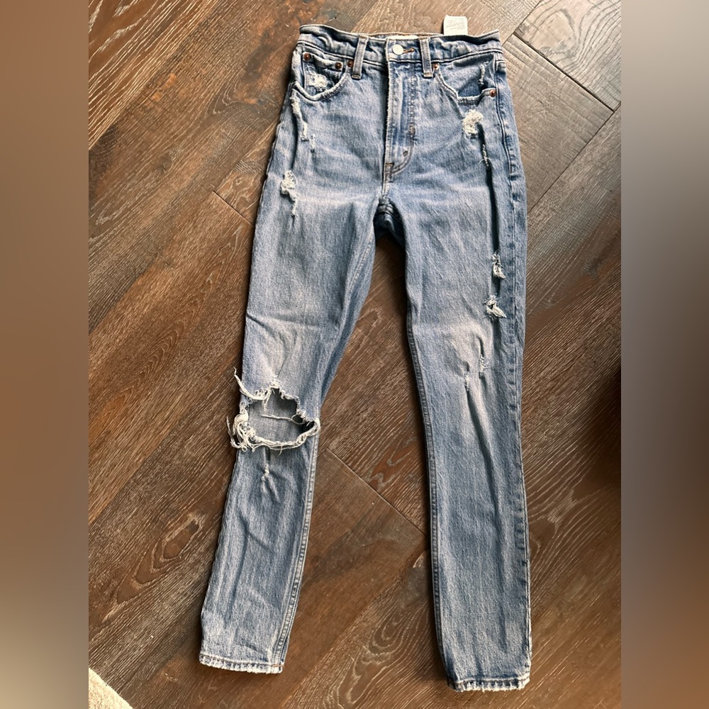 Ripped high rise skinny jeans